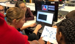 Students working in front of laptop